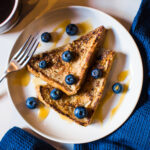 french toast with blueberries on a plate